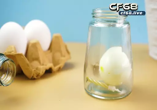 Cách lam ao thuat: Quả trứng tự chui vào lọ thủy tinh